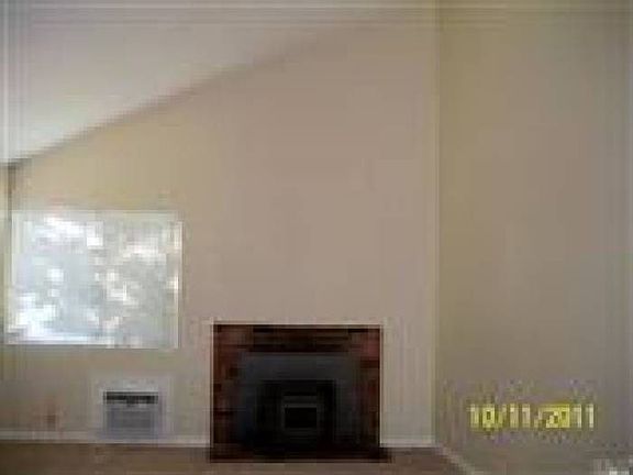 living room with fireplac