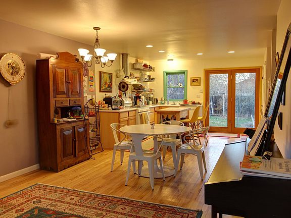 Kitchen with French door to large backyard. Washer/dryer closet in kitchen.