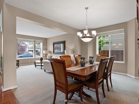 Formal dining room offers a great space for guest to gather around the table. 