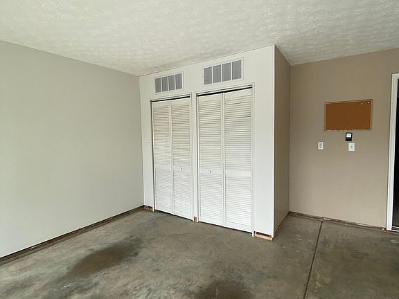 Covered Water Heater and AC unit