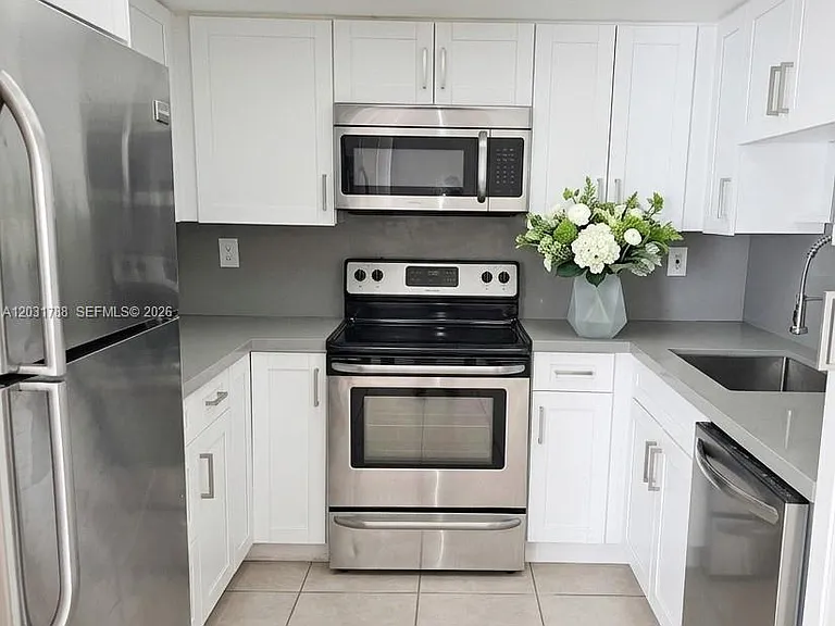 9070 SW 125th Ave #A104 — Photo 1
