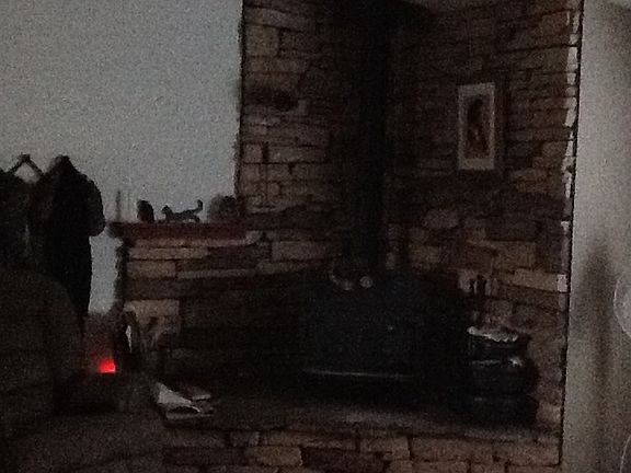 Living room with wood burner