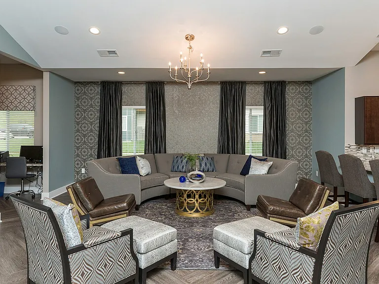 From lounging to productivity_this open-concept clubhouse connects seamlessly to the community kitchen and business center.