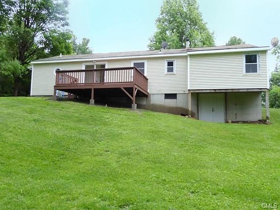 Walk-out basement leads to lush back yard with newly painted deck, come relax!