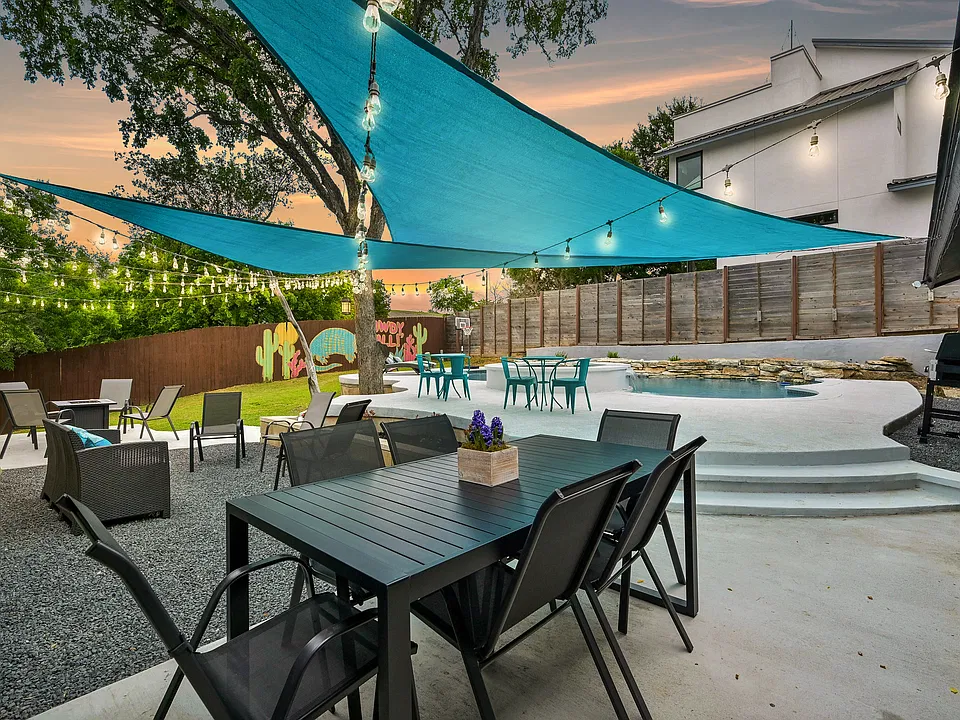 Plenty of seating including a dining table, firepit and grill for entertaining!