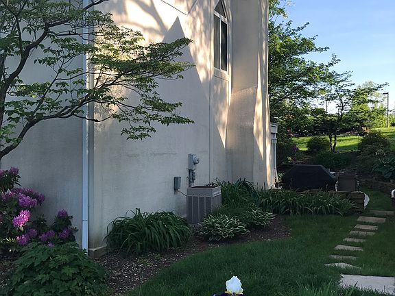yard between garage and home