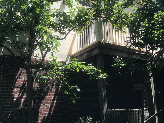 View along walkway to Balcony above with Private Entrance
