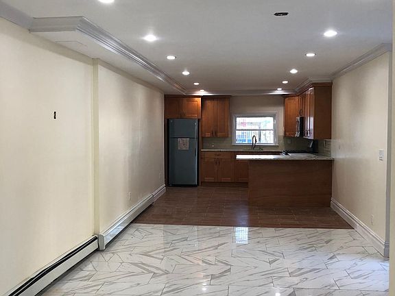 Kitchen, island, dining and living room