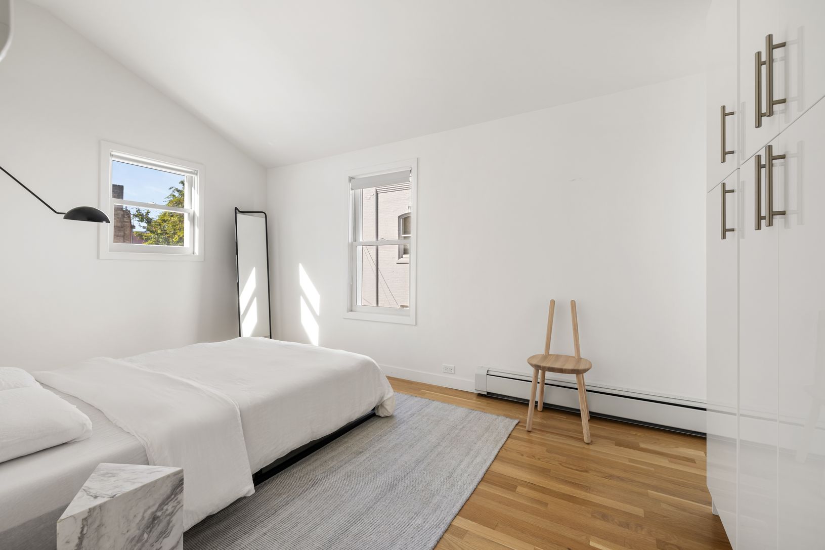 Tranquil bedroom with vaulted ceilings