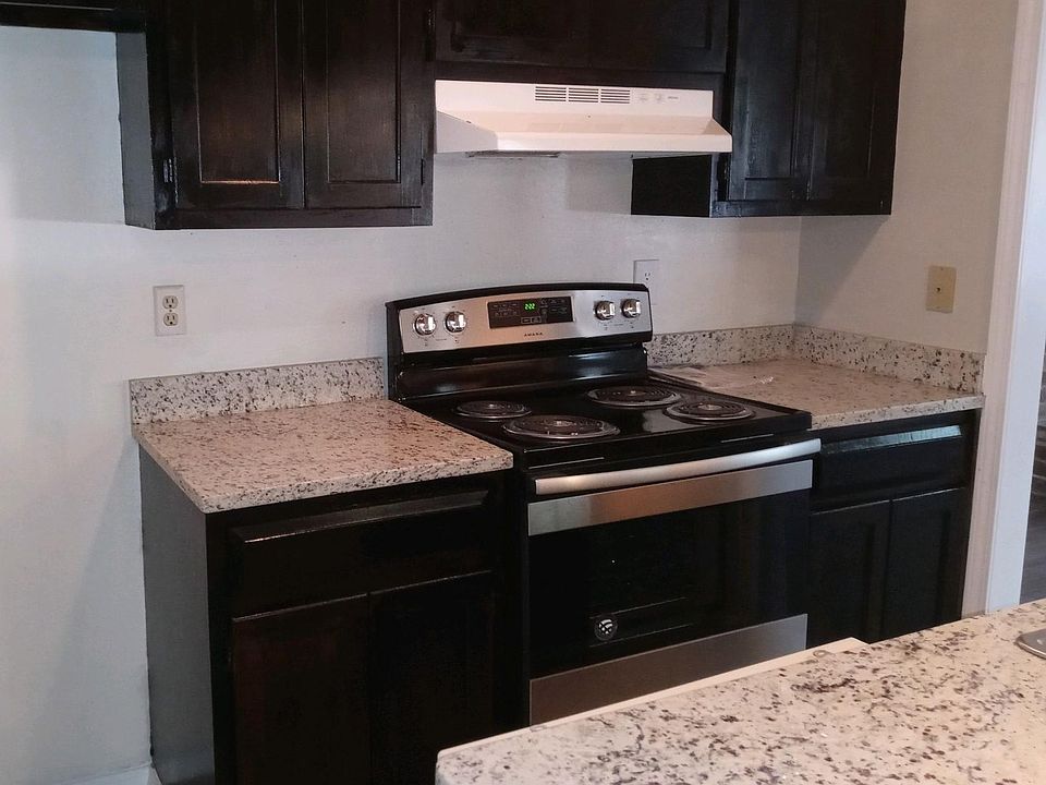 Kitchen with new stove and new granite counter tops