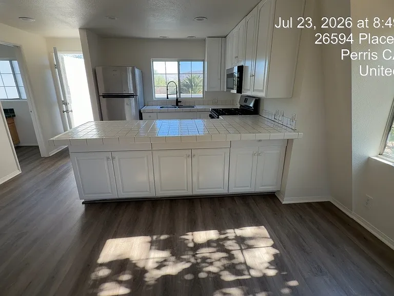Kitchen - repainted cabinets, etc.