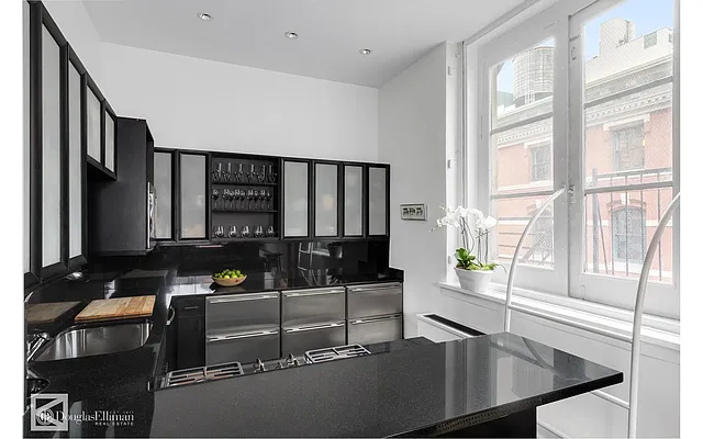 Sold by Douglas Elliman | media 18