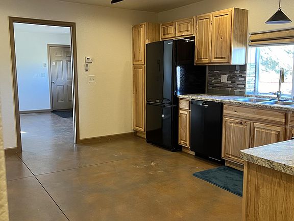 Kitchen, facing entrance door