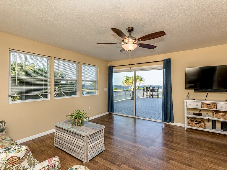 living room and view of the deck
