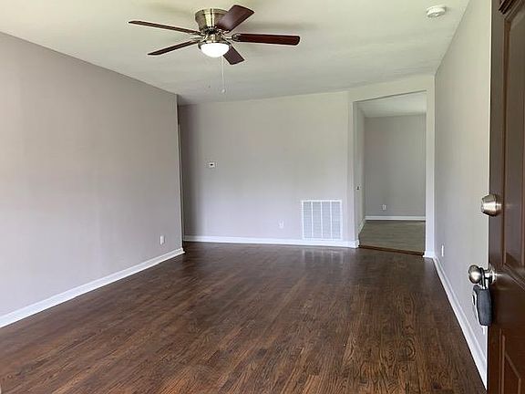 Hardwood floors in Living room, hallway, and bedrooms