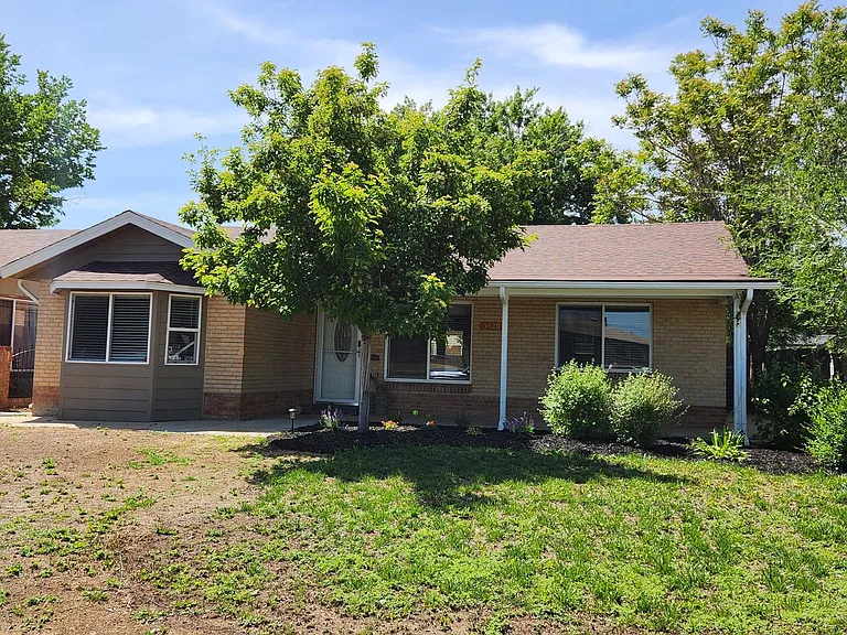 5520 E Thrill Pl — Photo 1