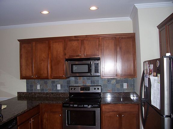 Kitchen with slate backsplash