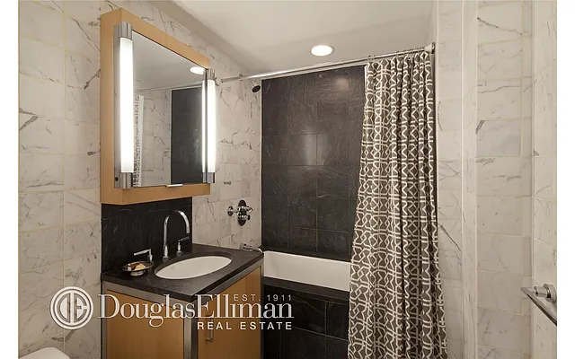 Sold by Douglas Elliman | media 9