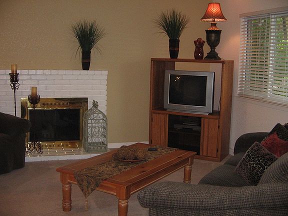Elegant formal living room w/ fireplace
