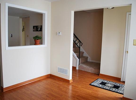 Front-facing dining room located off of foyer