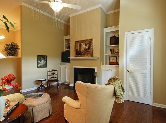 Fireplace & built in shelving. 