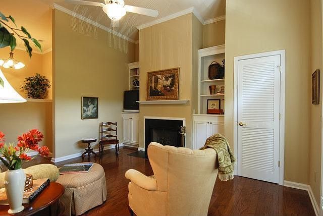 Fireplace & built in shelving. 