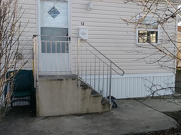 Front door and mailbox (steps and patio will be power washed