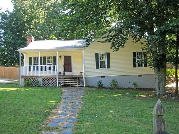 Beatiful rancher with country porch and low maintenance vinyl siding