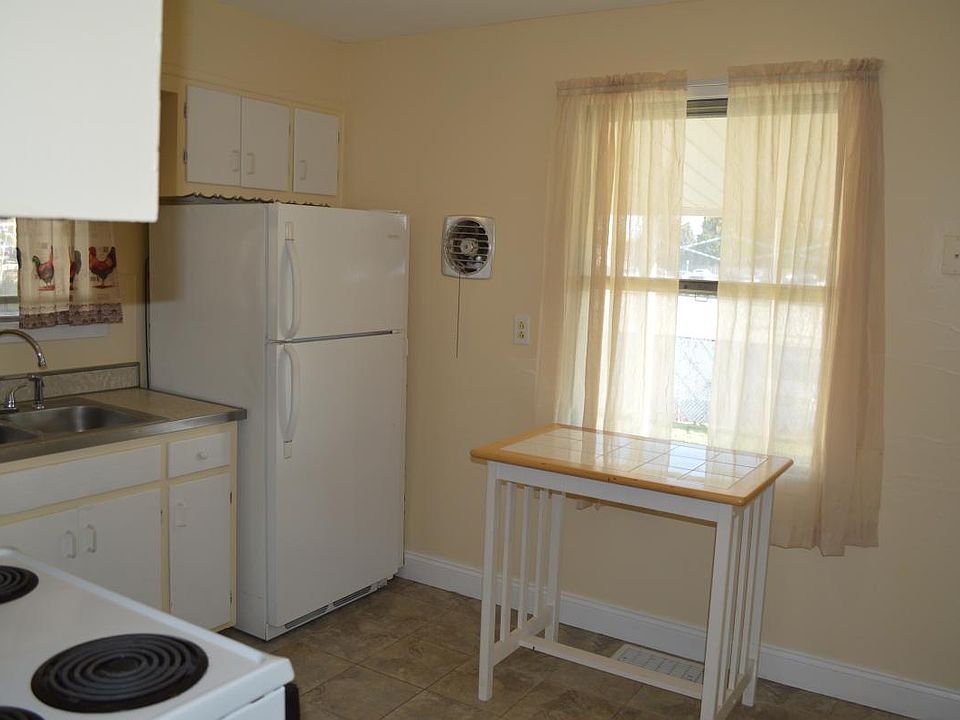 Kitchen window looking to backyard.