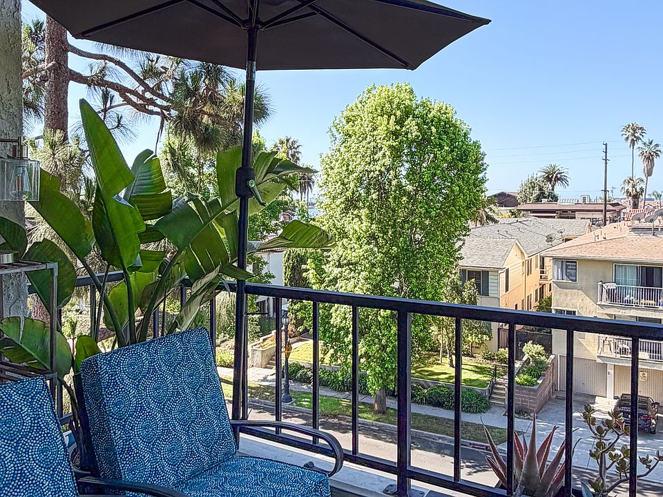 Tree-lined coastal views from private balcony