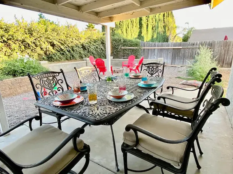 Outdoor dining under the covered patio