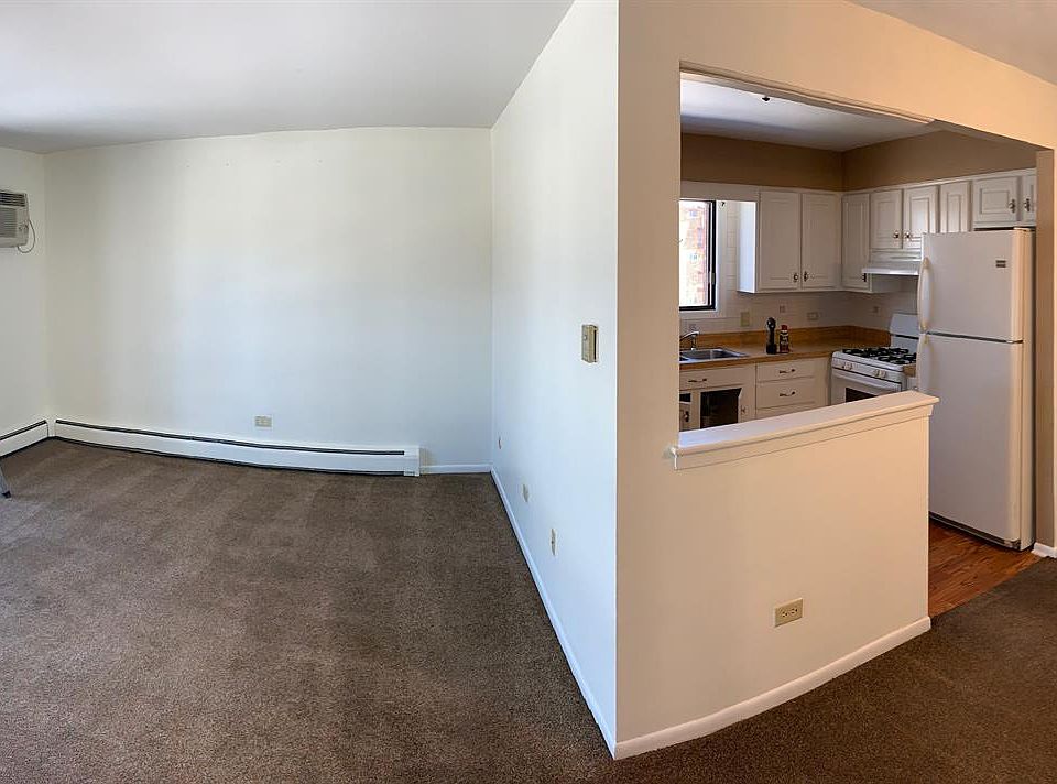 Panoramic of the Dining, Living and Kitchen