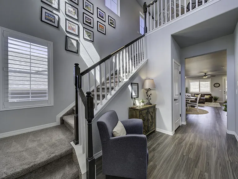 Hardwood floors and an open-concept layout with three levels