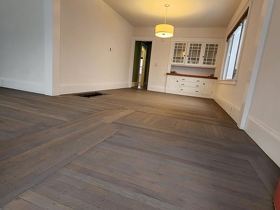 Dining room - refinished wood floors & fresh interior paint