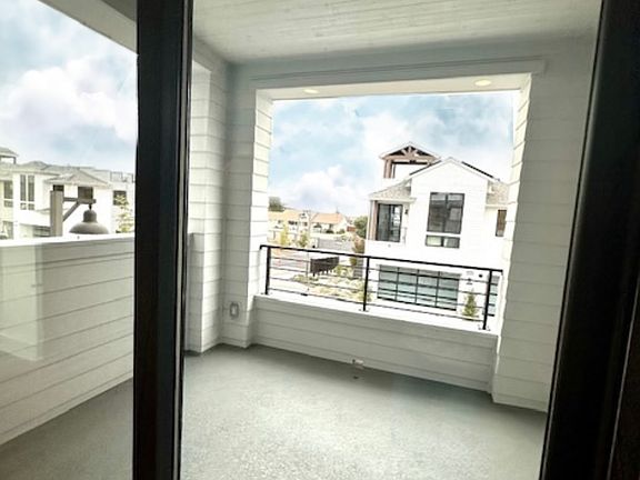 Covered Deck off the Living Room looking West.