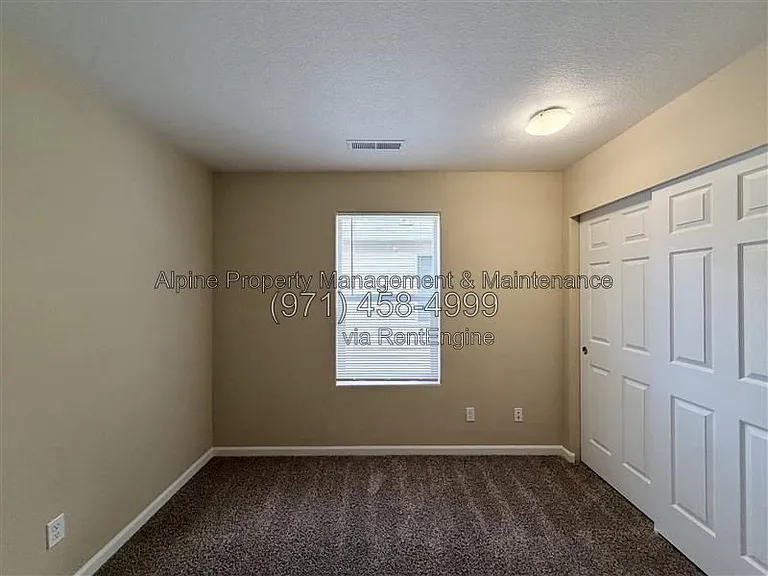 5758 NE Damsel Dr — Photo 25