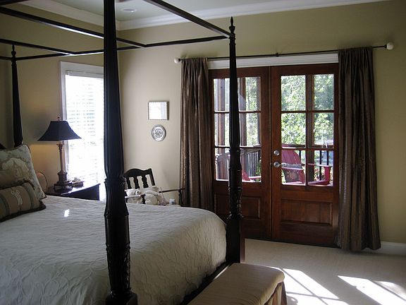 Master has french doors that lead to private screened in porch