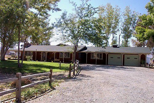 Where ranch meets lodge!  5 acres, reburbished, and ready to sell.