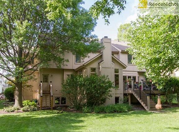 Beautifully landscaped yard by Hermes