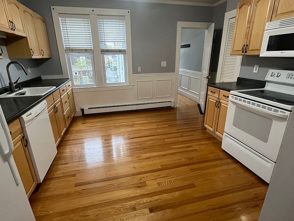 Kitchen with door to back hall open