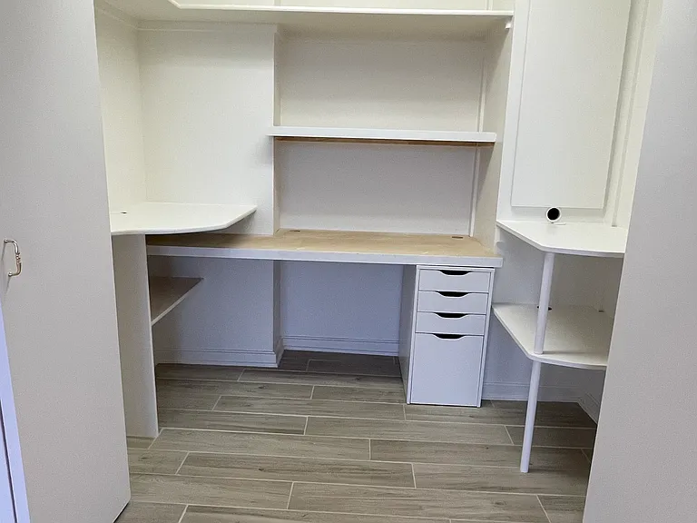 Built in desk for small office, sewing or craft area. Close the doors and it's hidden away!