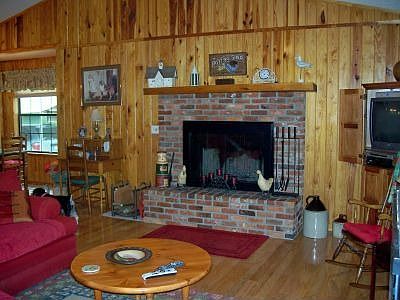 Cozy wood burning fireplace.