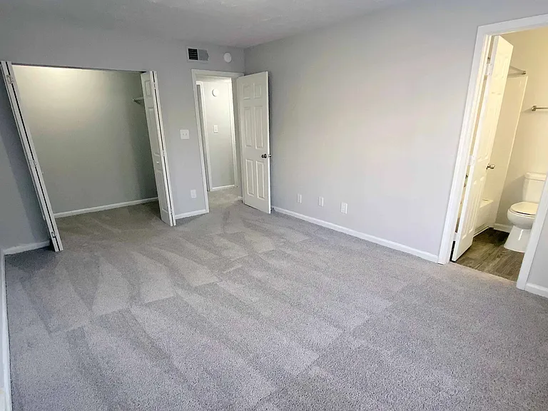Live masterfully! Your personal oasis awaits in this master bedroom with an ensuite bath and lush carpeting.