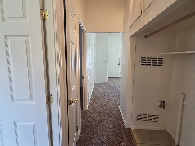 Hall with laundry hook ups