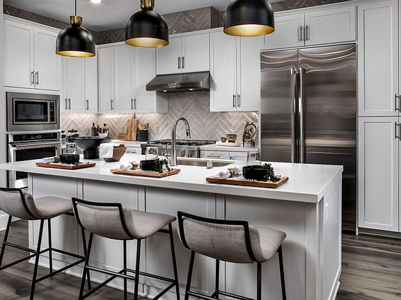 A photo of the kitchen in the Villas Plan 1 model home in Buena Park, California.