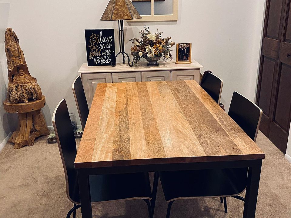 Dining area with walk in storage closet on right