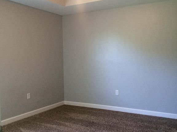 Master bedroom with ceiling fan & large closet