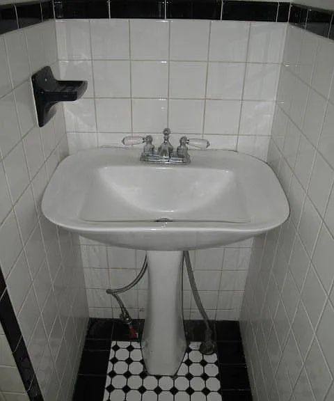 Downstairs bath with pedestal sink