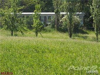 VERY NICE 3 BEDROOM/ 2 BATH MOBILE ON 9.91 BEAUTIFUL ACRES.