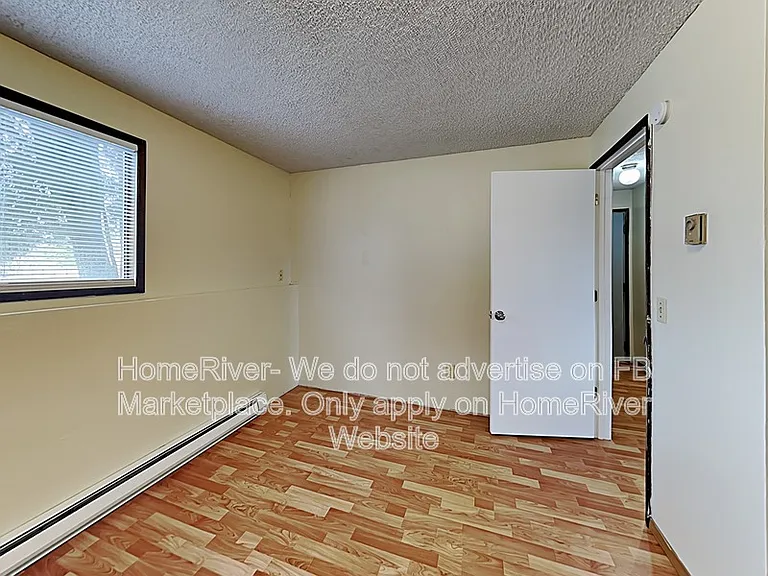 12620 E 31st Ave — Photo 14